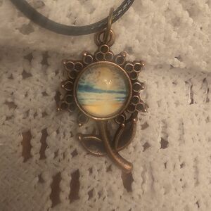 Sunset Beach In Flower Shaped Pendant On 18" Adjustable Cord Necklace